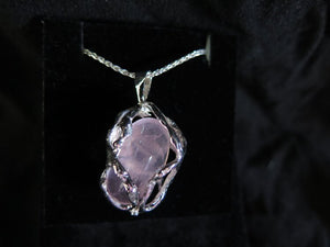 <b>No. 38 </b> Sterling Silver and Rose Quartz inner (Rotates)